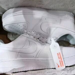 Nike All-White Low-Top Sneakers